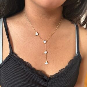 Brand new gold plated mother of pearl butterfly necklace